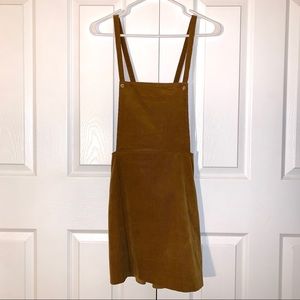 Corduroy Skirt overall with adjustable straps.